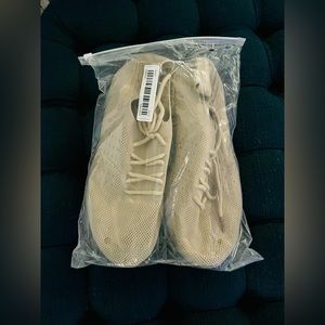 Indoor workout sneakers. Never worn. New in bag. Beige size 9 (run a little big)